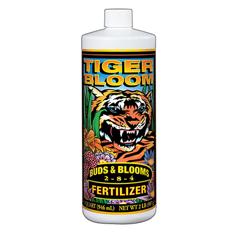 A bottle of FoxFarm Tiger Bloom Liquid Plant Food with a colorful label featuring a tiger and flowers.