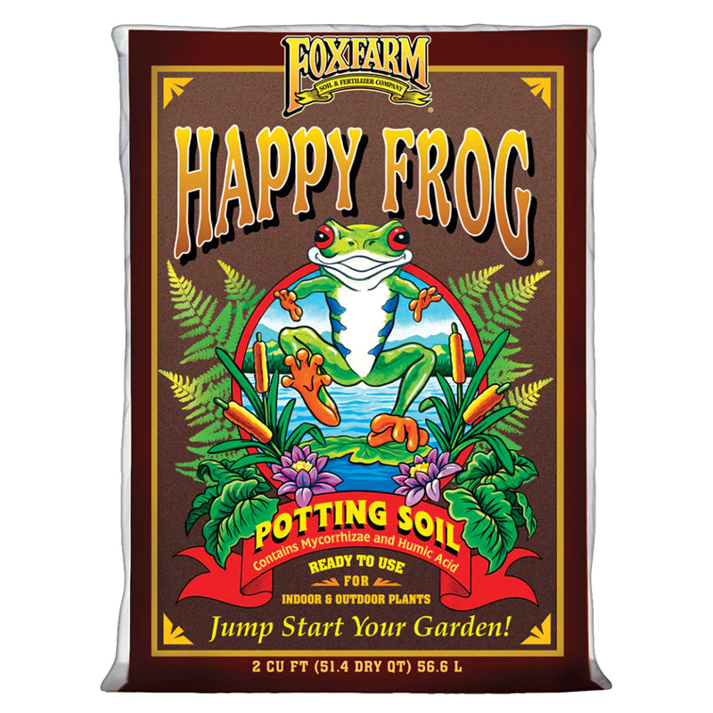 A bag of FoxFarm Happy Frog Potting Soil, featuring a cartoon frog against a backdrop of ferns and water lilies.