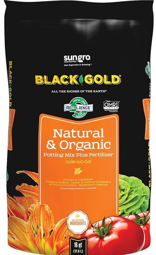 Bag of Black Gold natural and organic potting mix with vegetables on a black background
