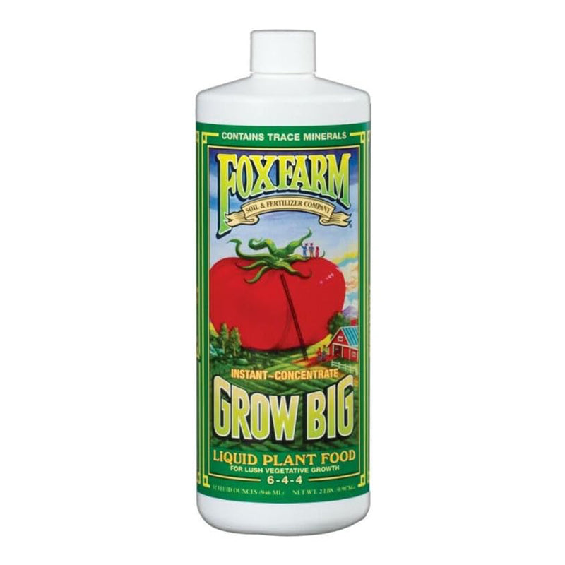 A bottle of FoxFarm Grow Big Liquid Plant Food, 1 Quart, with a label featuring a picture of a tomato.