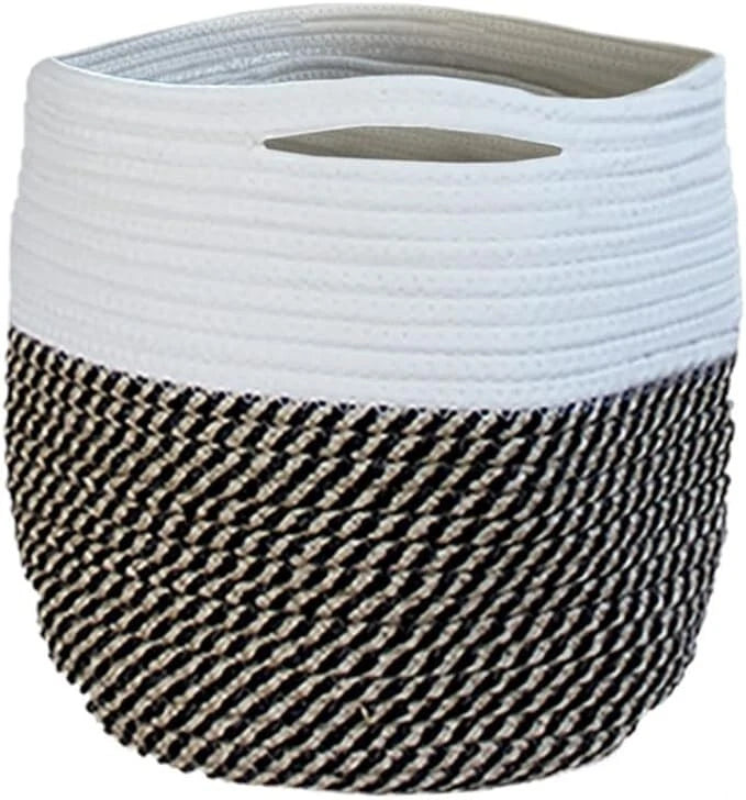 Woven basket with black and white pattern on a white background